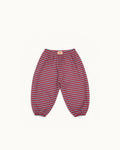 Red and aqua striped Pickle baby balloon pants with gathered ankles, back view
